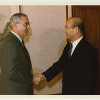 Atiyeh shaking hands with Korean President Chun Doo-hwan